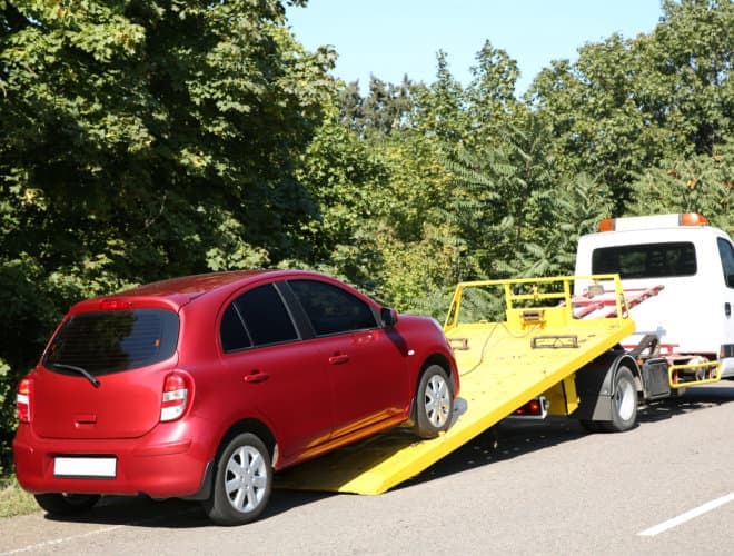a red car towed